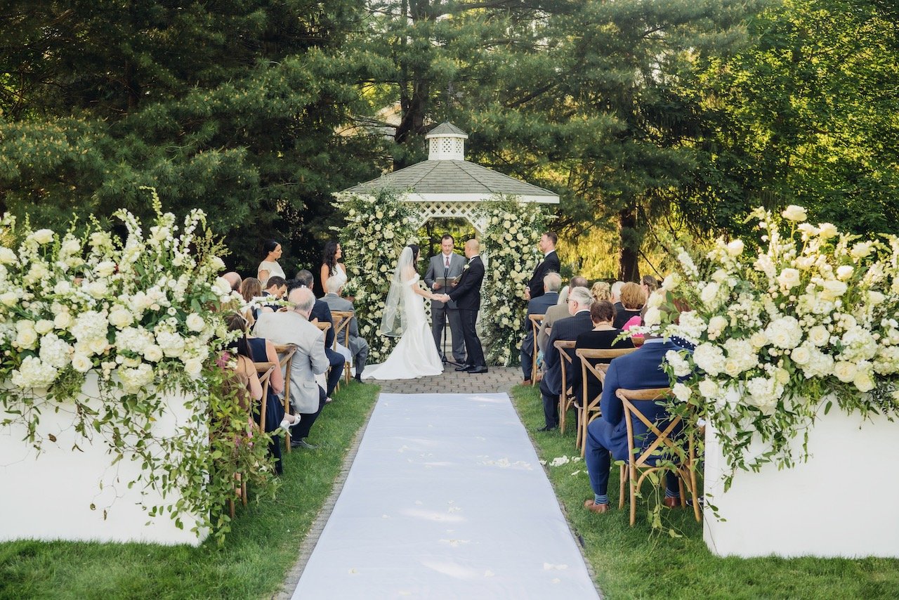 Garden ceremony with flowers by TK Floral Design
